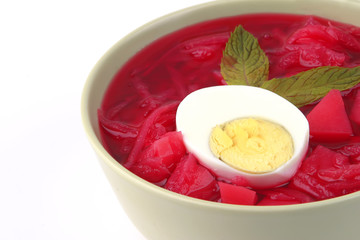 vegetable soup in green bowl