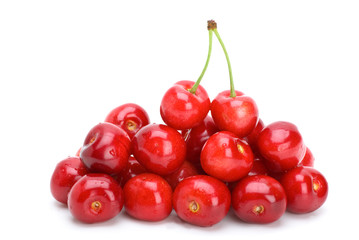 Pile of red cherries without stalks and pair berries on the top