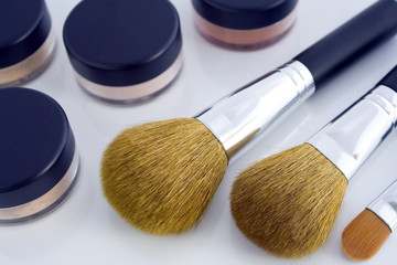 Make-up brushes and powder jars