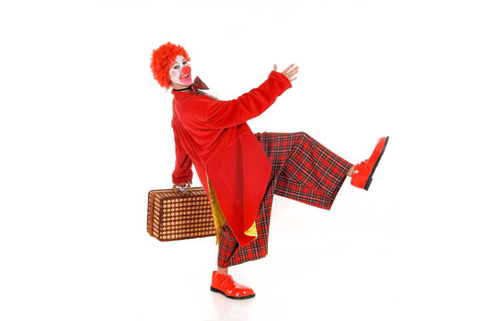 Clown on suitcase with horn hi-res stock photography and images - Alamy