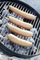 Barbecuing sausages