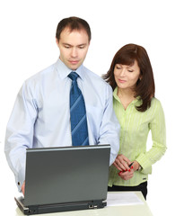 A man and woman work.