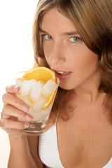 Young woman drinking cold water