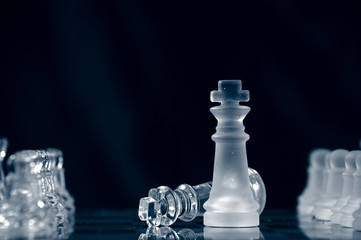 checkmate on chessboard against black background