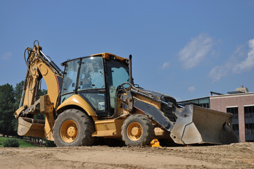 Fototapeta premium Large Backhoe on Work Site