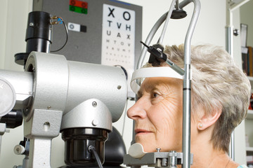 Lady having eye test examination