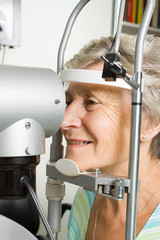 Lady having eye test examination