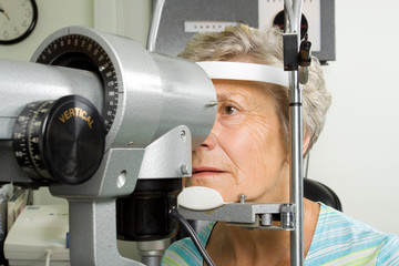 Lady having eye test examination