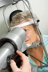 Lady having eye test examination