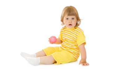 Small smiling girl with toy ball