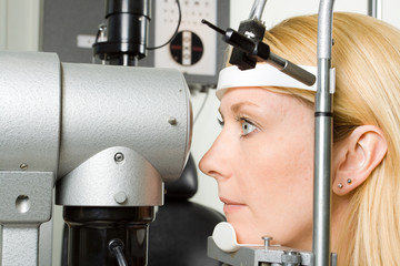 Young woman having eye test