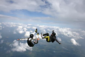 Fototapeten Zwei Fallschirmspringer in sitzender Position © Joggie Botma