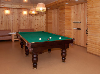 Table for game in billiards in the house