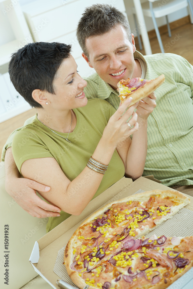 Canvas Prints Couple eating pizza