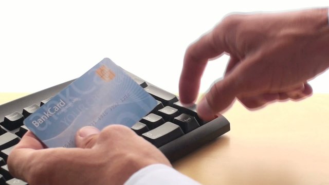 man shops and pays online