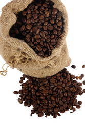 Coffee in a sack and spilled on a white background
