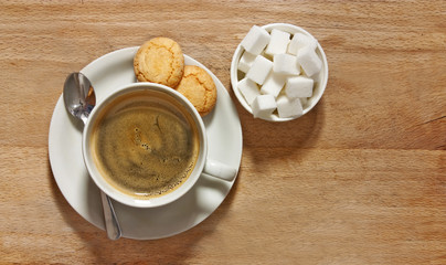 coffee and biscuits on table from above