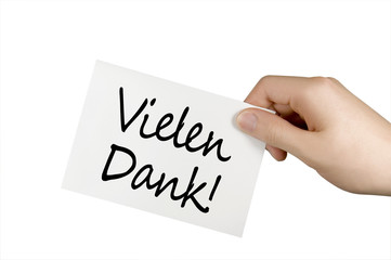 Blankokarte in einer Hand mit Vielen Dank