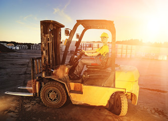 Female worker driving cargo truck