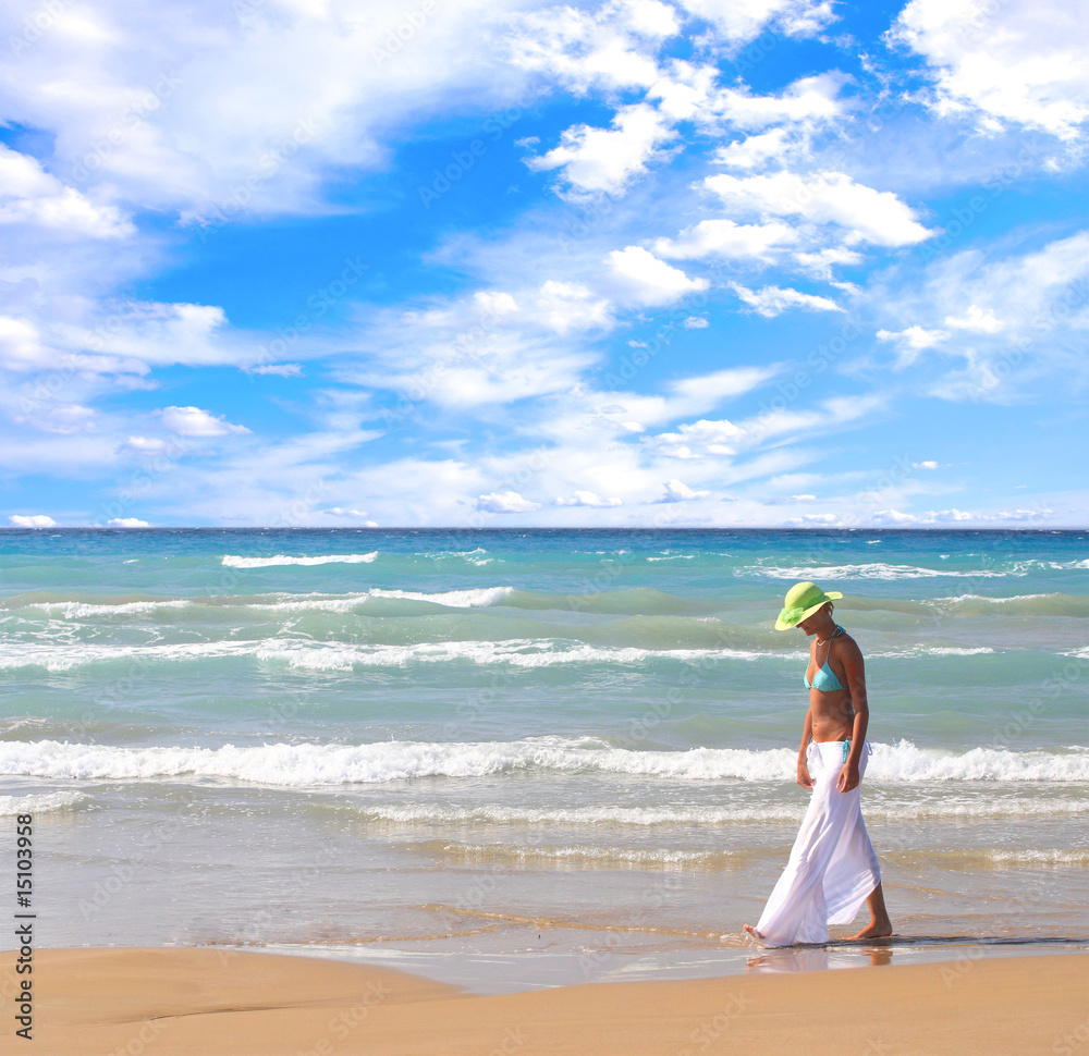 Wall mural woman enjoying the sea