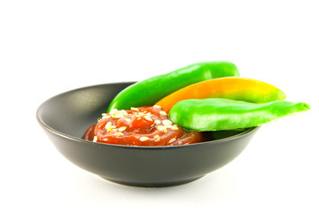 Chillis and Dipping Sauce in a Bowl