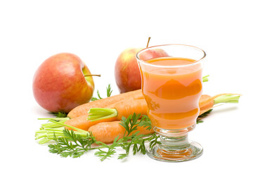 glass of fresh juice, some carrots and apples