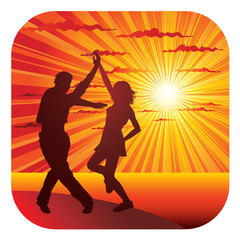 Young couple dancing on the seacoast