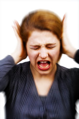Noise and stress concept - woman covering ears
