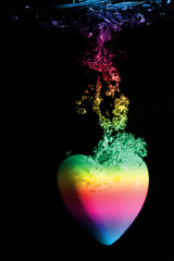 colorful heart shape splash underwanter