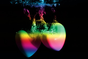 colorful heart shape splash underwanter