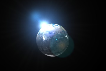 Fototapeta na wymiar Sun emerging over planet earth