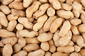 Background made of roasted peanuts in a pile