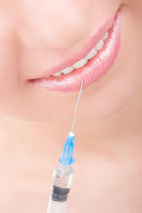 smiling girl with syringe