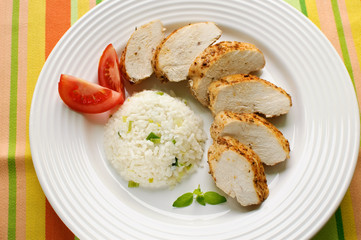 Roasted chicken  meat with white rice and vegetables