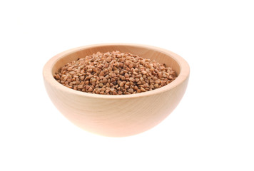 buckwheat seeds in a wood bowl