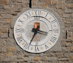Fototapeta na wymiar Clock on Romanesque Tower, Koper