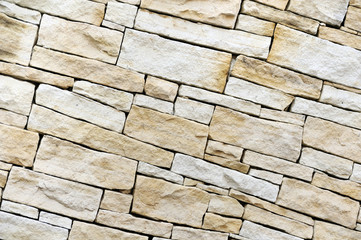Wall made from sandstone bricks
