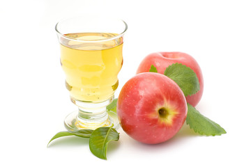 glass of fresh apple juice and fresh fruits