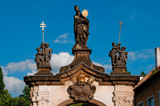 monastery gate with sculpture of saint norbert