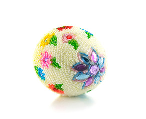An egg with beads isolated