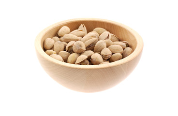 pistachios in a wood bowl