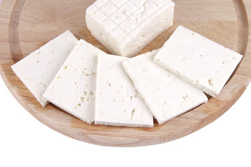 sliced white cheese on plate
