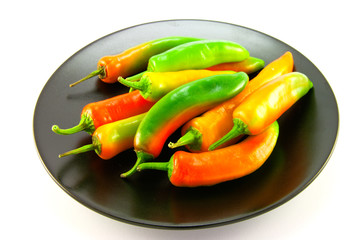Assorted Chillis on a Black Plate