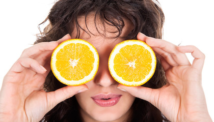cheerful woman with two slices of orange