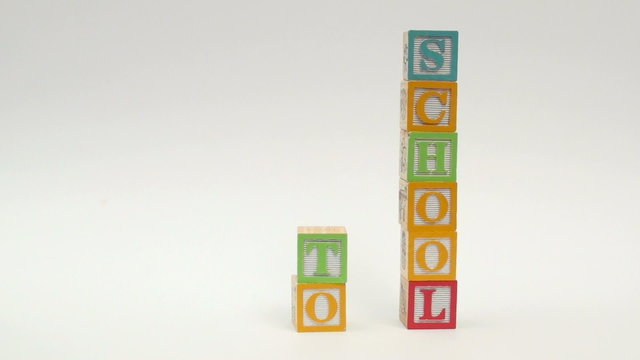 Wooden building blocks spell out BACK TO SCHOOL