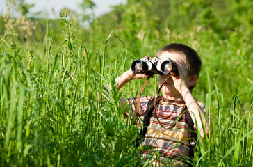 Kid with binocular