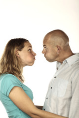 Couple making faces to each other