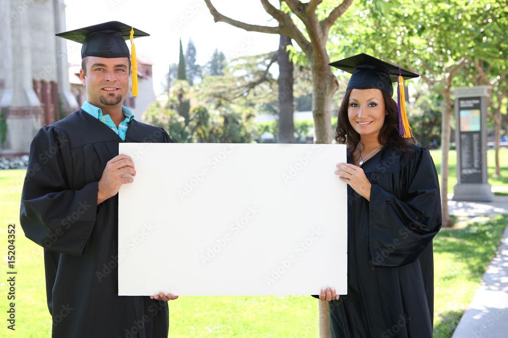 Wall mural man and woman graduates