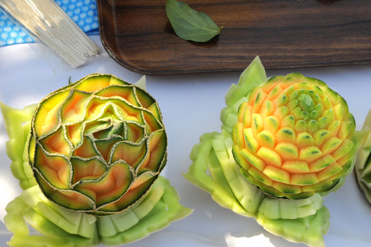 Naklejki Carved Cantaloupes on a Table
