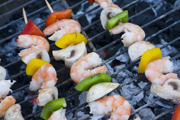 some shrimp skewers on barbecue